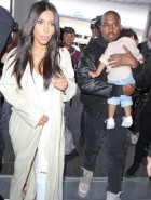 Armenia, here we come! Kim Kardashian returns to her roots with long hair for trip with Kanye West and sleepy North