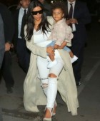 Royal welcome! Kim Kardashian, Kanye West and Khloe arrive in Armenia to a cheering crowd and chaotic scenes