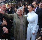 Elderly Armenian woman waits three days to give her idol Kim Kardashian a bouquet of flowers... as Pope Francis speaks out about 'genocide' in the country on 100th anniversary of killings