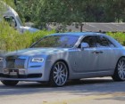 Hard to keep up! Kim Kardashian gets herself a new $400K Rolls Royce luxury car... and promptly customizes it