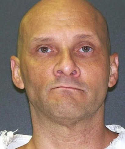 Texas inmate is executed by lethal injection after mouthing 'I'm sorry' to relatives of one of the men he murdered