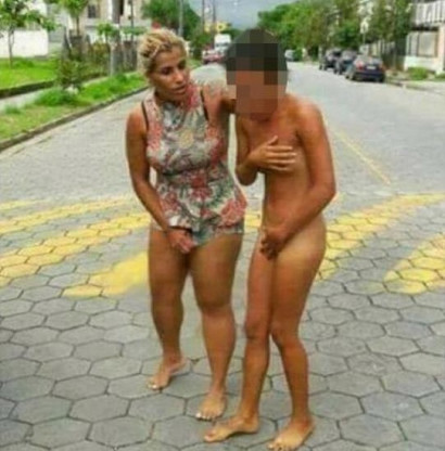 Furious wife frogmarches a love rival NAKED through the streets after catching her in bed with her husband