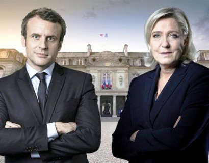 French presidential election: Emmanuel Macron and Marine Le Pen go to second round – as it happened