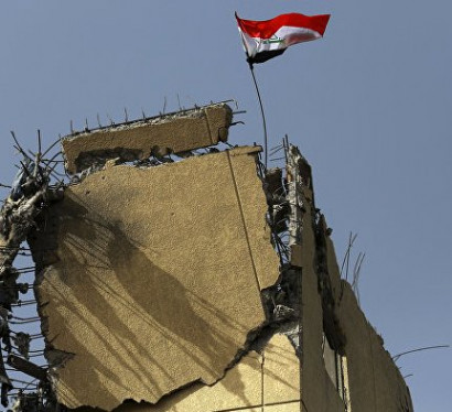 Над Мосулом развеваются флаги Ирака