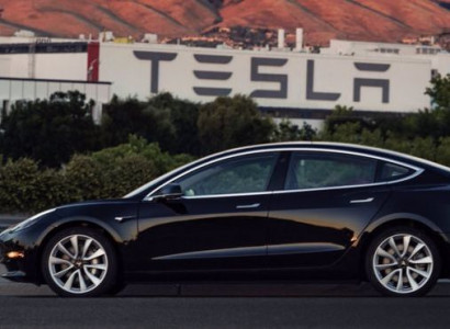 Elon Musk shows off Tesla's first Model 3