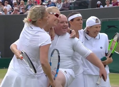 Wimbledon fan invited on court to put on skirt and face Kim Clijsters' serve after shouting advice
