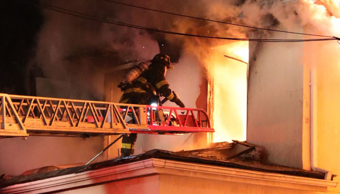 Fire officials say lit menorah sparked fatal Hanukkah blaze