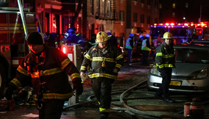New York apartment fire: at least 12 people killed in Bronx