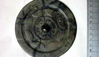 Ancient Chinese bronze mirror unearthed whole in Fukuoka dig