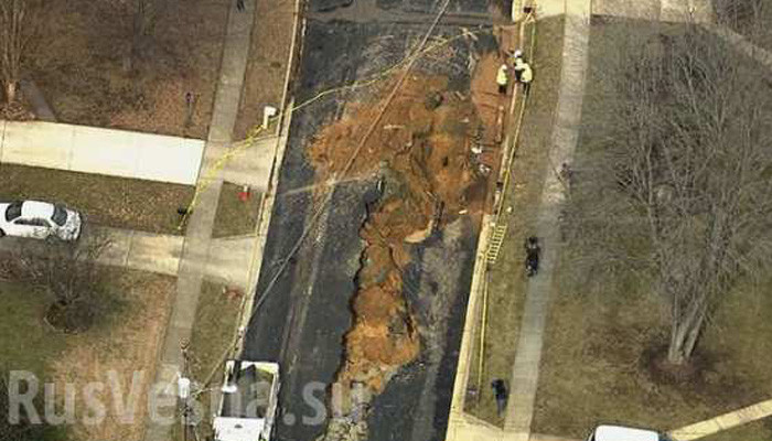 Huge sinkhole opens up on street in Fairfax, Virginia