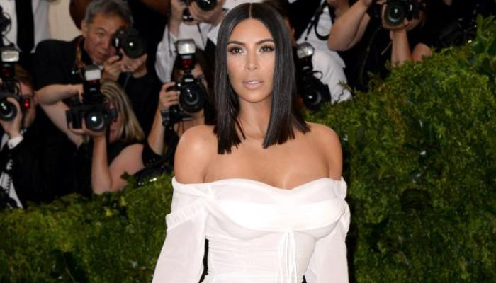 Kim Kardashian shares darling photo of baby daughter Chicago in pink onesie after she turns two months old