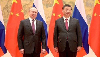 Путин сообщил, что в мае посетит Китай
