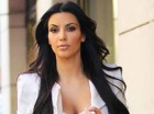 Looking swell! Kim Kardashian shows off baby bump in bikini just days before she was rushed to hospital to deliver daughter