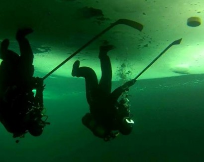 Like ice hockey? These guys in Siberia play it upside-down underwater