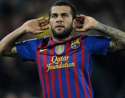 Barcelona’s Dani Alves grabs journalist’s microphone and sings into it