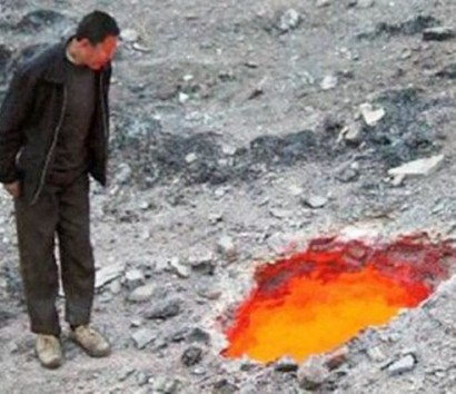 Gateway to hell? Chinese villagers horrified to find mysterious 3ft-wide hole spewing fire from local hillside