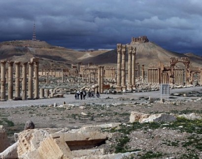 The slaughter of Palmyra's citizens begins: First images emerge from Syrian city over-run by ISIS... and show rows of people beheaded as terror group celebrates freeing Islamists from state prison