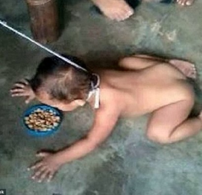 Child who was filmed being dragged around on a LEASH by his mother is taken into care after she turned herself in to social services when she saw negative feedback in the Philippines