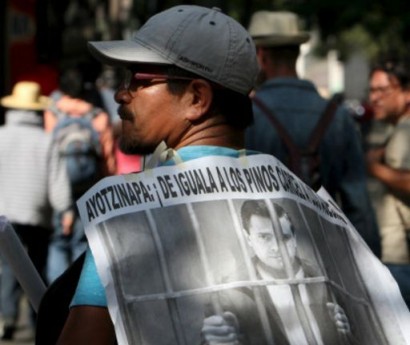 Mexico missing students: Search uncovers 60 mass graves