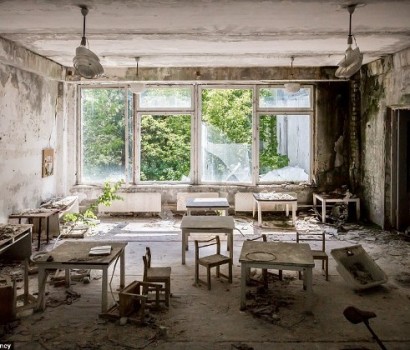 Inside Chernobyl's no-go zone: Haunting photos from town abandoned after radiation disaster 30 years ago reveal desolate hospitals, rotting homes and discarded possessions