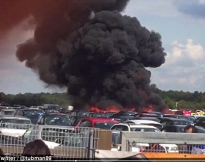 Bin Laden's 'stepmother and sister among four killed' after their private jet crashes into a UK car auction when it tried to land near London