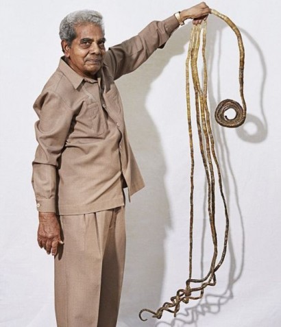 Indian man with the world's longest fingernails on ONE HAND admits he hasn't cut them since 1952... and plans to donate them to a museum