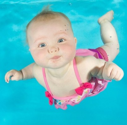 Real life water babies! Photos capture the hilarious expressions pulled by children as young as three months as they dive underwater for the first time