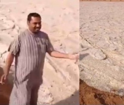 Iraqi ice flood footage shows rivers of hail running through the desert following freak storm