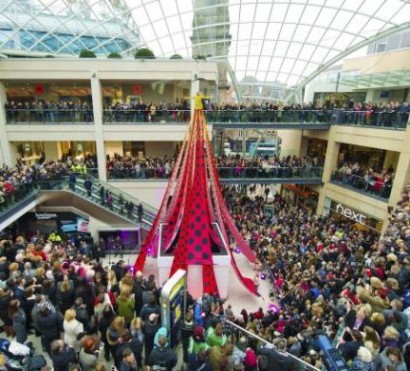 You'll need heels for this one! Designer Henry Holland unveils the world's longest dress at new Trinity Leeds shopping centre