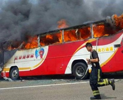 Taiwan tourist bus fire kills all 26 on board