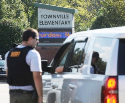 Teen kills father, opens fire on South Carolina schoolyard: police