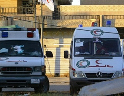 Suicide bombers in ambulances kill 21 people in Iraq: officials
