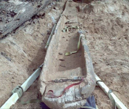 Couple find the largest ever intact Native American canoe measuring 33 feet and dating back 1,000 years after noticing it poking out of the mud on a Louisiana riverbank