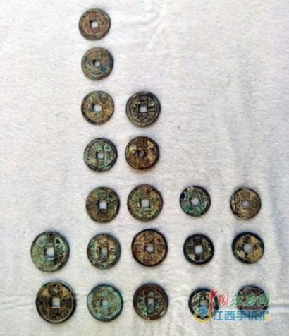 5.6 tons of ancient coins unearthed under house in Jiangxi