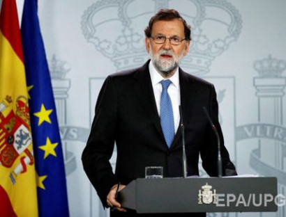 Рахой распустил правительство и парламент Каталонии