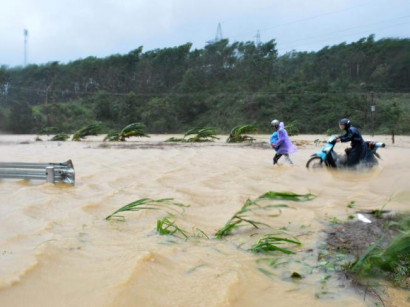 Vietnam grapples with the deadly, tragic aftermath of Typhoon Damrey just days out from APEC