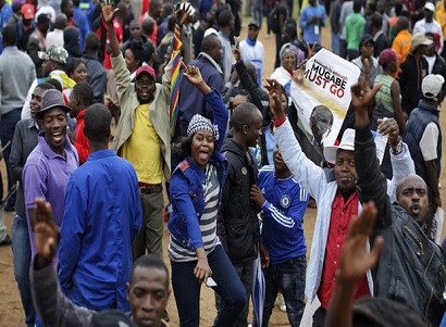'Leave Zimbabwe now': thousands of protesters call for Robert Mugabe to go