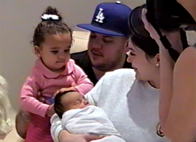 Kim Kardashian and Kanye West's newborn daughter Chicago is seen for the FIRST TIME in Kylie Jenner's birth announcement video