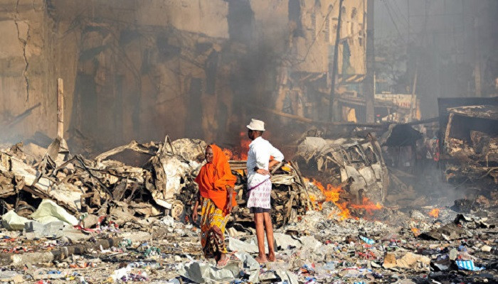 Two car bombs explode in Somali capital and kill 18 people