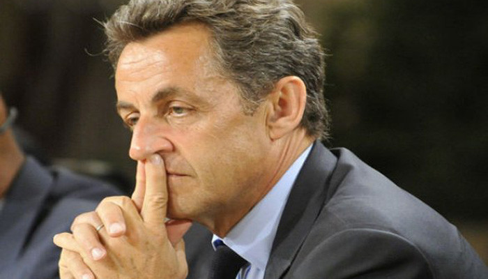 Sarkozy says Libya funding accusations make his life "hell"