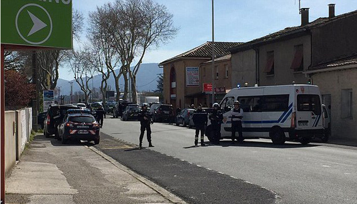 ISIS gunman 'shoots dead shop worker' after taking hostages at French supermarket
