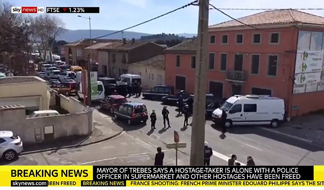 ISIS gunman 'shoots dead shop worker' after taking hostages at French supermarket