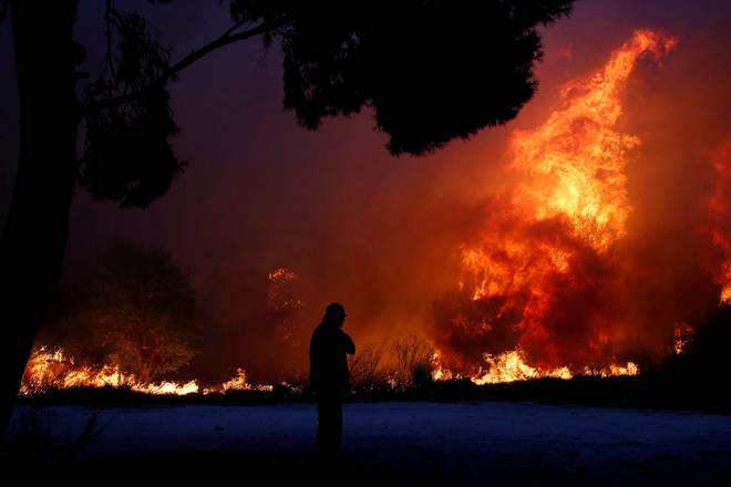 Greece wildfires: At least 50 killed near Athens, officials say