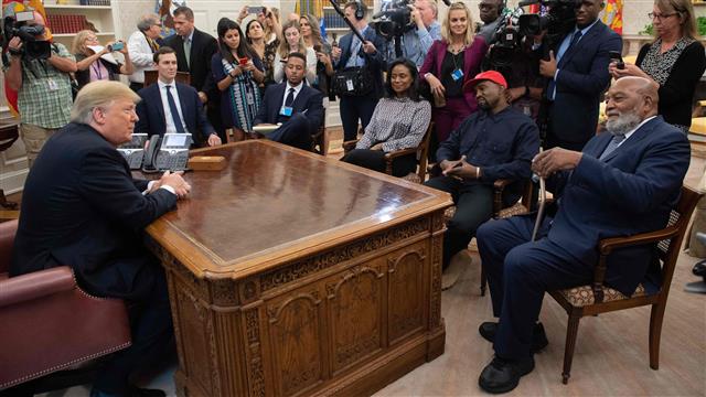 Kanye West said his 'MAGA' hat makes him 'feel like Superman' during meeting with President Trump