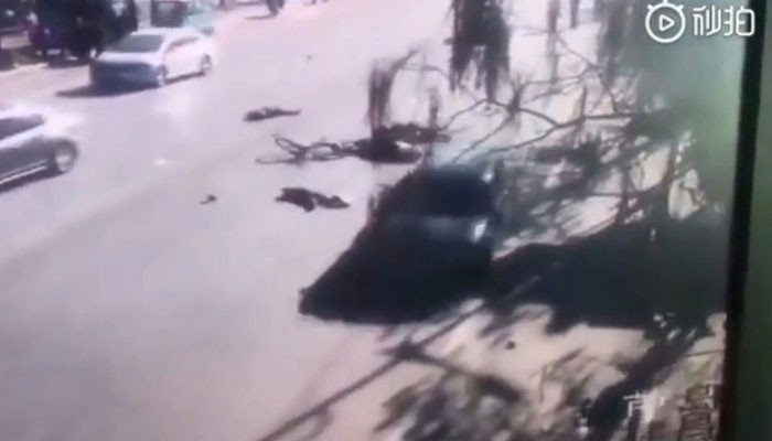 Car strikes crowd at China school, killing 5 and hurting 18