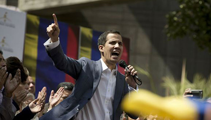 Venezuelan Opposition Leader Declares Himself President, With Trump Backing