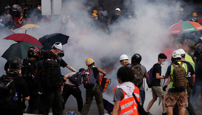 Hong Kong: protesters take to streets on anniversary of China handover