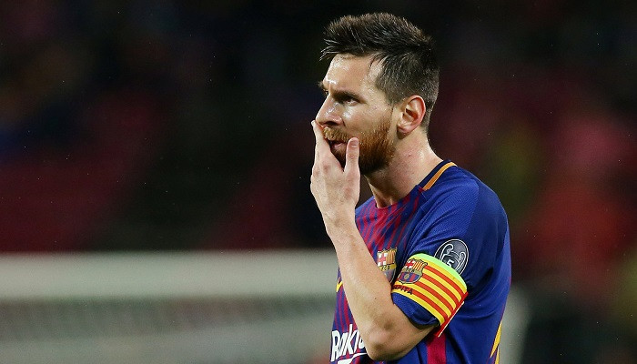 Messi suffers calf injury on return to Barcelona training