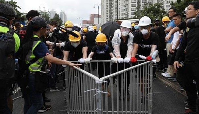 Hong Kong police fire tear gas at anti-government protesters