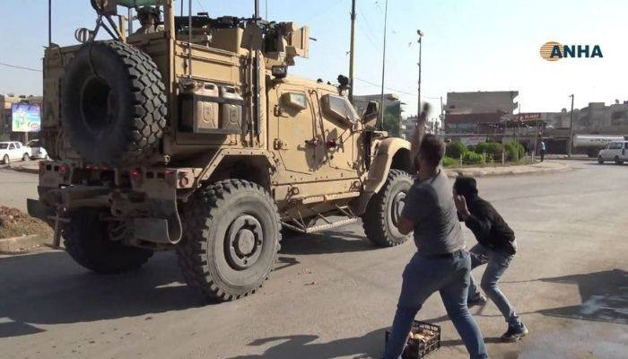 The videos of Kurds throwing tomatoes and stones at retiring US soldiers